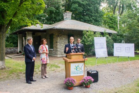 Kevin Murphy, Buffalo Market President for Bank of America, speaks at the groundbreaking of the Rumsey Shelter restoration. Also pictured, Alan Bozer, Chair of the Buffalo and Erie County Greenway Fund Standing Committee, Stephanie Crockatt, Executive Director, Buffalo Olmsted Parks Conservancy, and Council Member Joel Feroleto